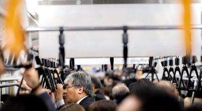 城市广场上大规模社会运动现场,人群手持标语,51大事件社会专题收录,黄昏逆光拍摄震撼感强